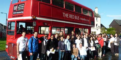Big red volunteering bus