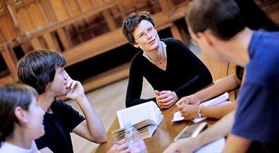 Tutor speaking to students
