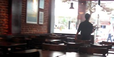 Waiter in cafe