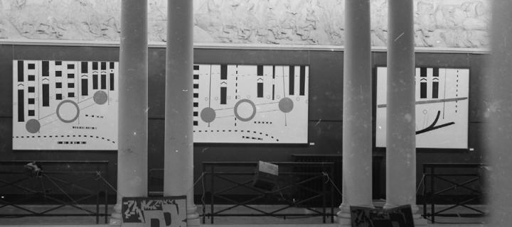 Peter Brüning’s Diversion paintings on north corridor, as seen across the Sculpture Court, with Ferdinand Kriwet’s banners