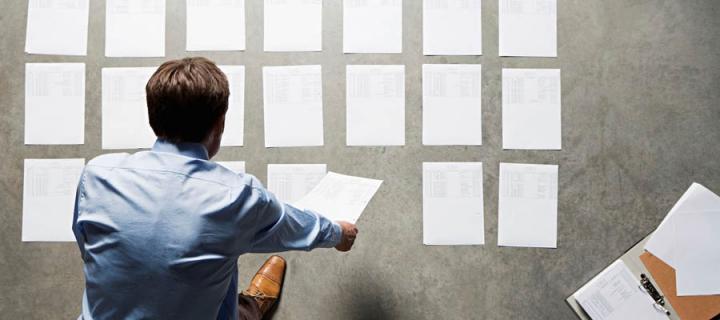 A man surveys research results