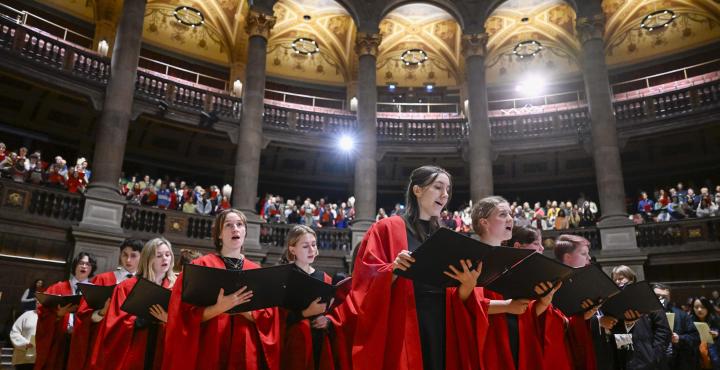 The University of Edinburgh Choir sing at a carol service in McEwan Hall, Edinburgh