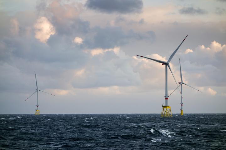 Three wind turbines from an offshore windfarm in the North Sea