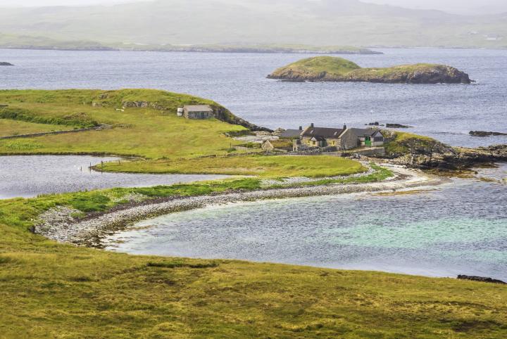 A croft house on the coast at Ling Ness, South Nesting, Shetland, Scotland, UK