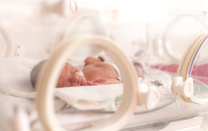 Premature baby pictured in an incubator