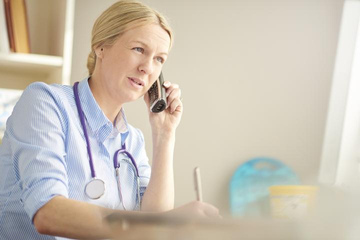 Doctor on the phone