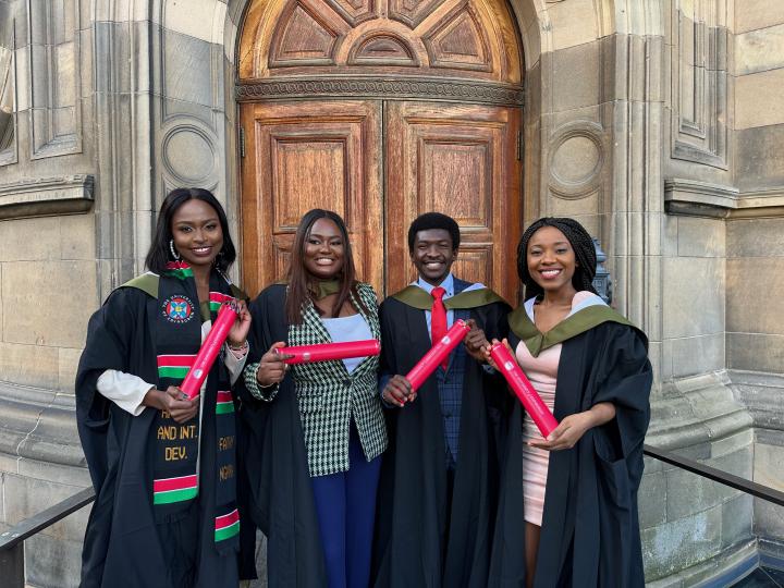 Image of four Mastercard Foundation scholars