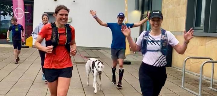 Jasmin Paris and runners outside vet school
