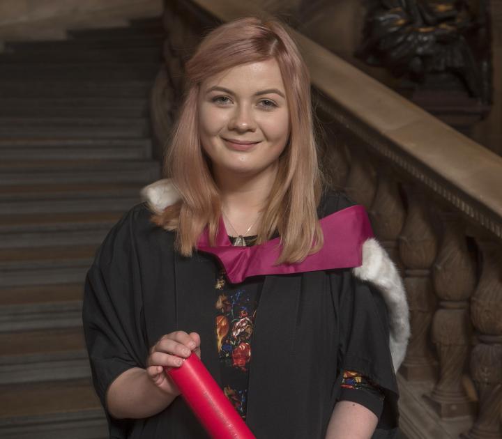 Current student Caitlyn Taylor accepting a degree on behalf of the Edinburgh Seven.