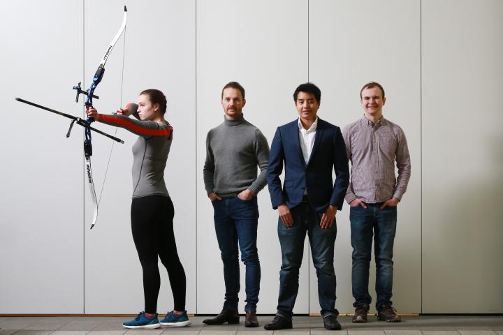 International archer Fiona Inglis wearing PlayerData Edge, chairman Mike Welch, and co-founders Roy Hotrabhvanon and Hayden Ball