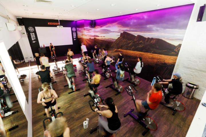 Students participating in a spin class