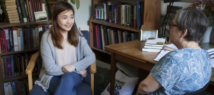 Dr Bingham talking to a student