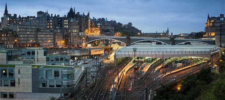Waverley train station in Edinburgh at dusk