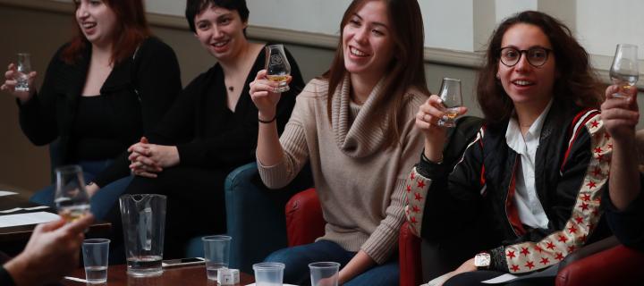 Group of people at a whisky tasting session during Edinburgh Gaelic Week. 