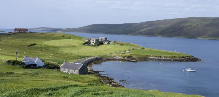 Remote houses on the Shetland coast