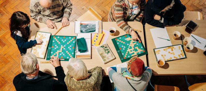 Birdseye view of people playing Gaelic Scrabble.
