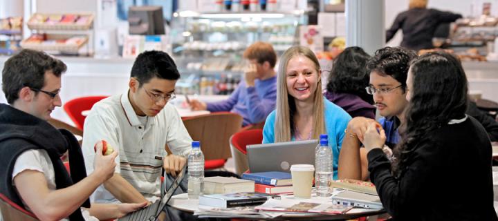 Study group chatting in Business School café