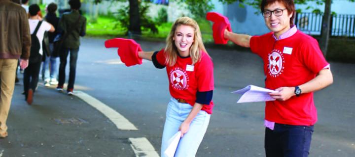 Two student ambassadors showing the way