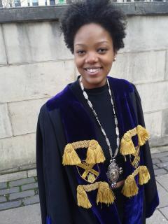 Briana Pegado wearing Universrity robes