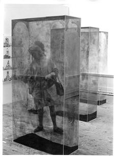 The art critic Cordelia Oliver among glass containers by Erich Reusch and photographs by Bernd and Hilla Becher in studio E.25.