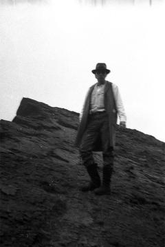 Joseph Beuys on Salisbury Crags, Holyrood Park, Edinburgh, on 7 May 1970. Photo