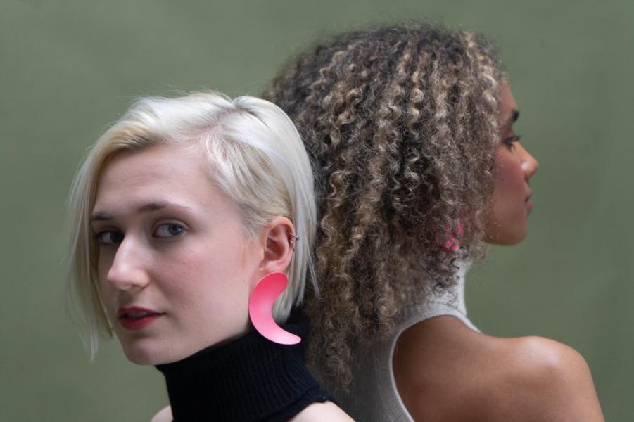 Two models wearing Guy Howe Conners’s striking jewellery collection 