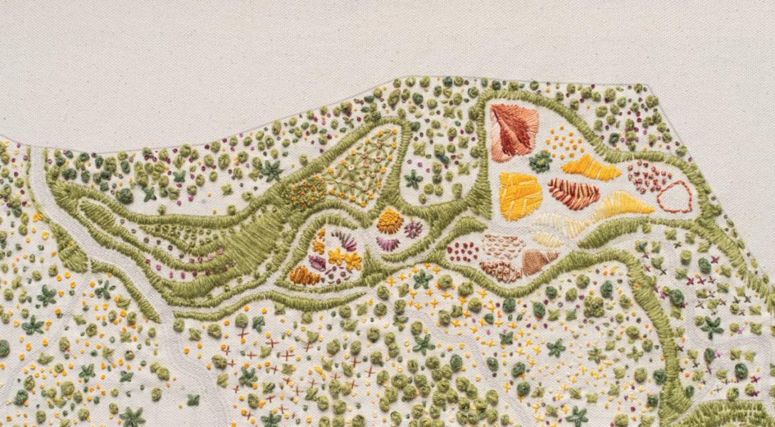 Piece of embroidery by Larry Huo, which aims to educate people about soil and how it can address the climate crisis
