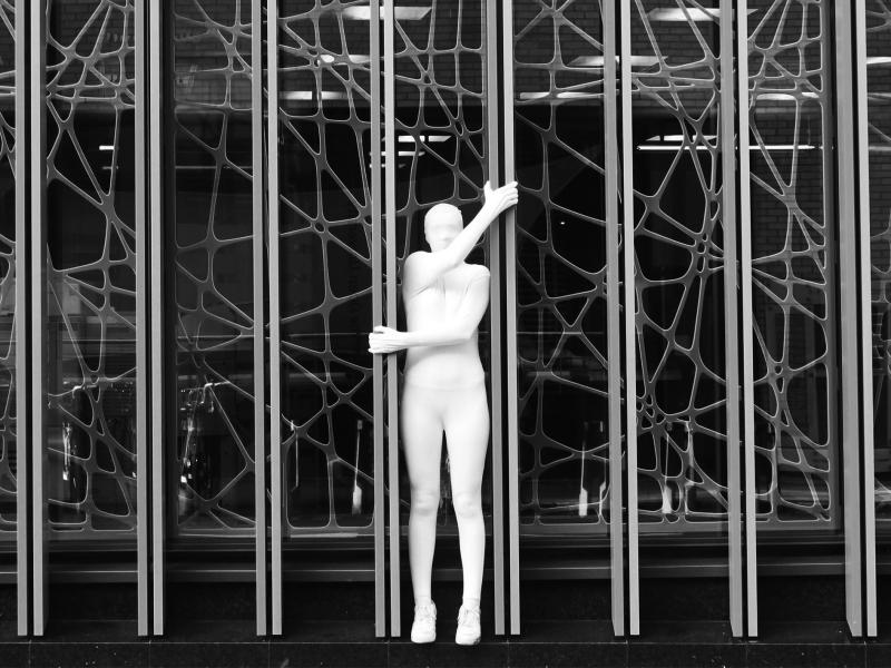 industrial setting, person head to toe in white suit