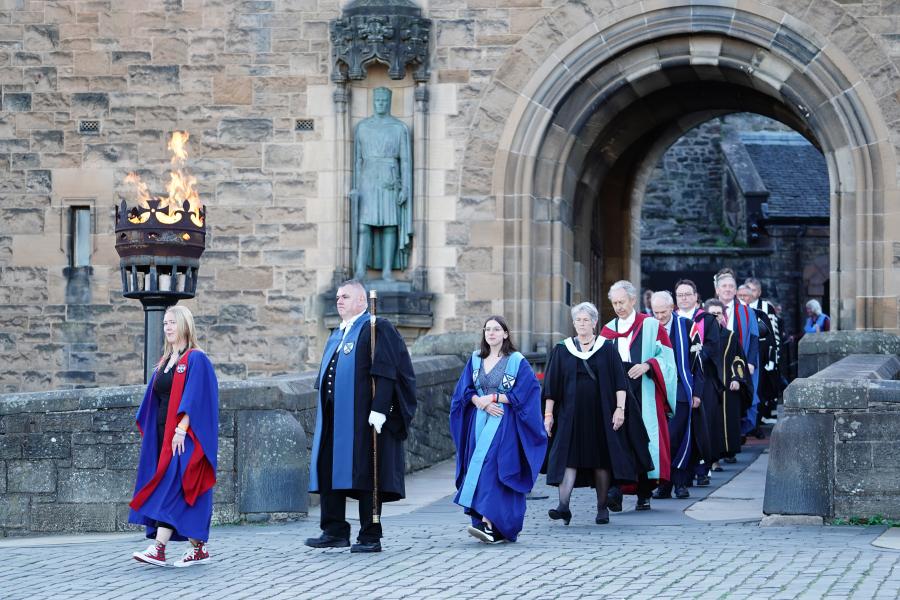 Ceremonial procession at the castle gates
