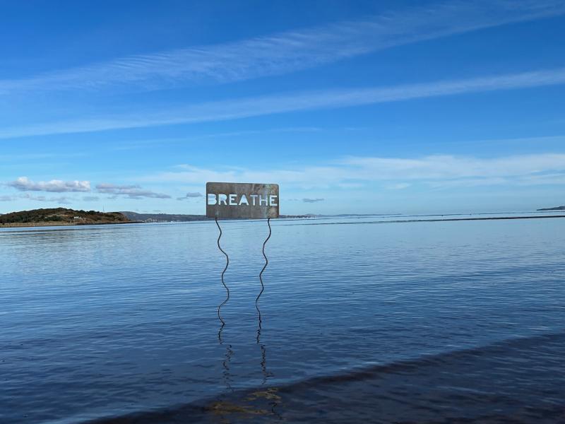 sign on beach