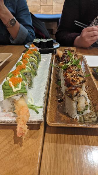 Photo of plates of sushi on a table