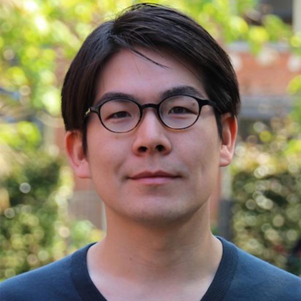 Uegaki Wataru smiling to camera.