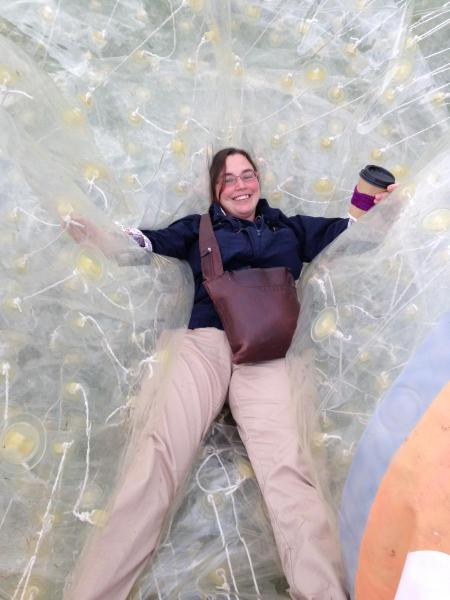 Atlanta Cook lying inside the zorb ball