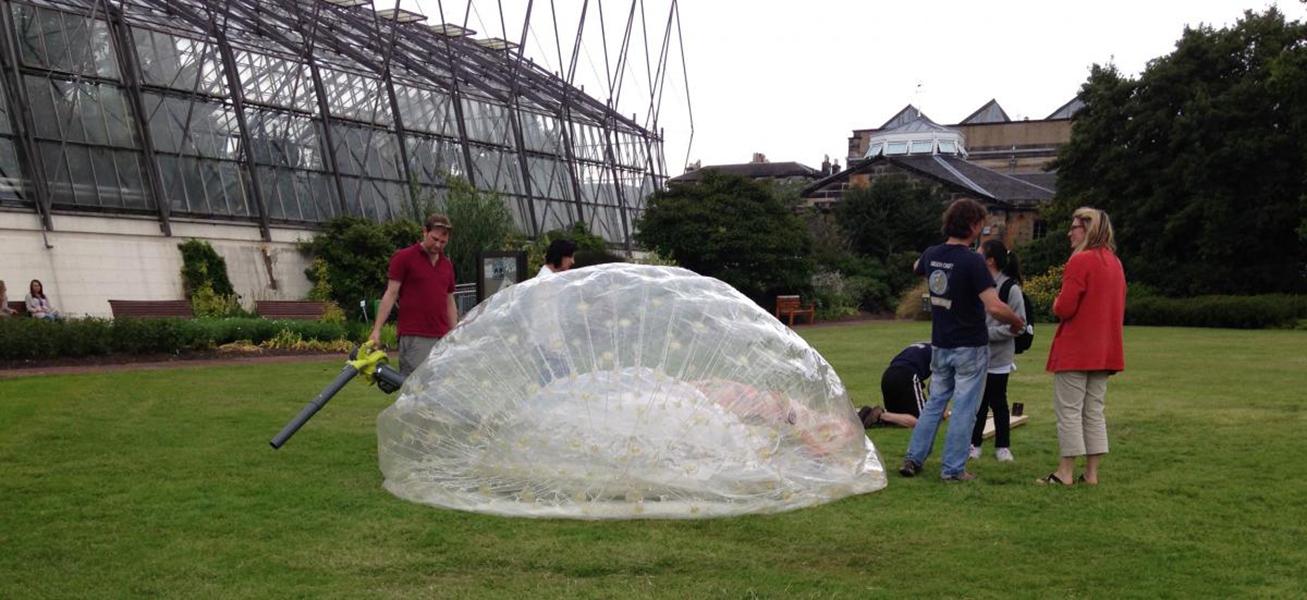 Members of the public gathered around the zorb ball